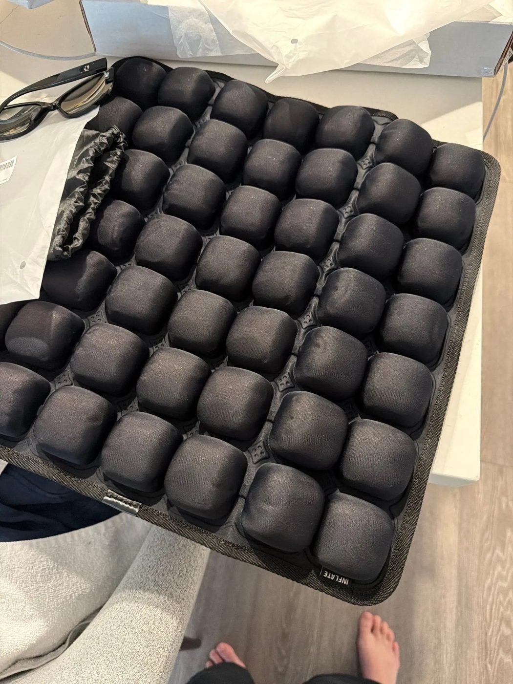Reviewer's photo of the black 49-cell cushion, inflated, at home